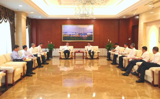 黄伟会见中国华能董事长、党组书记温枢刚一行